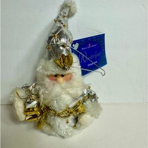 NWT. Beautiful Santa Ornament. Adorable Santa wearing silver quilted outfit